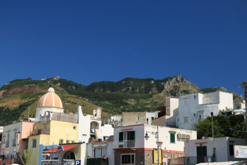 Panorama of the town of Forio d’Ischia, near Naples. 	Dome of the church of San Gaetano. The mountain and the blue sky. - MyVideoimage.com