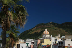 Panorama of the town of Forio d’Ischia, near Naples. 	Dome of the church of San Gaetano. The mountain and the blue sky. - MyVideoimage.com