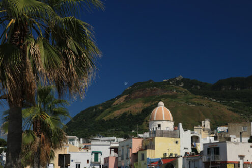 Panorama of the town of Forio d’Ischia, near Naples. 	Dome of the church of San Gaetano. The mountain and the blue sky. - MyVideoimage.com