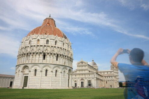 Photography with smartphone. Pisa, Tuscany. Piazza dei Miracoli of Pisa. People photograph with smartphone the monuments and the leaning tower. - MyVideoimage.com | Foto stock & Video footage