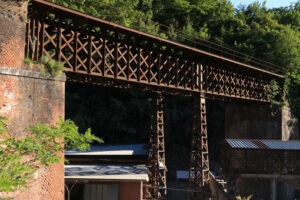 Ponte di ferro a Carrara. Iron bridge with reticular structure. The bridge was part of the - MyVideoimage.com | Foto stock & Video footage