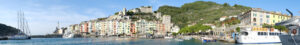 Portovenere houses. Village holiday destination near the Cinque Terre. Typical colorful houses, the harbor with boats and the church. - MyVideoimage.com | Foto stock & Video footage