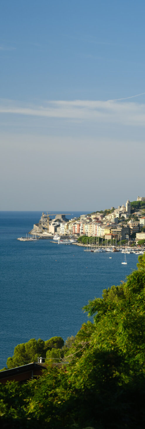 Portovenere sunset light near the Cinque Terre, at sunrise light. The bay with the marina, the fort, the church of San Pietro. - MyVideoimage.com | Foto stock & Video footage