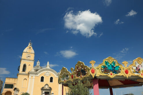 Procida. Church with bell tower in Procida. Blue sky with clouds., near N - MyVideoimage.com | Foto stock & Video footage