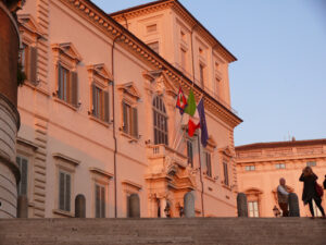 Quirinale. Palazzo sede del Presidente della Repubblica italiana. Quirinal Palace. Residence of the President of the Italian Republic. Facade with pink sunset light. - MyVideoimage.com | Foto stock & Video footage