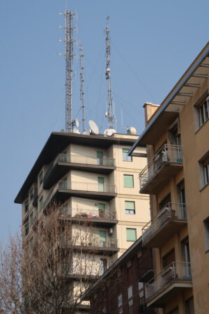 Radio wave transmission antennas mounted on a building in the city center. - MyVideoimage.com