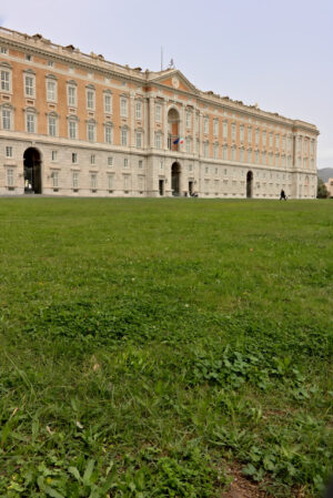 Reggia di Caserta, Italy. Main facade of the palace with the green of the garden in the foreground. Caserta royal palace photo