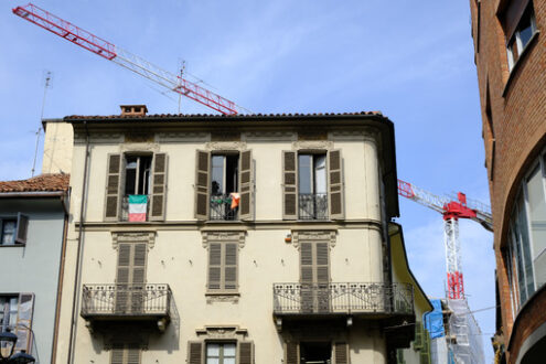 Renovation site. Tower crane in the historic city center. Stock photos. - MyVideoimage.com | Foto stock & Video footage