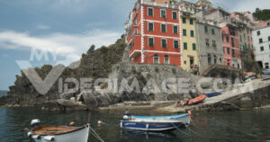 Riomaggiore houses footage video stock. Riomaggiore to the Cinque Terre. Colored houses on the sea.  Video footage.