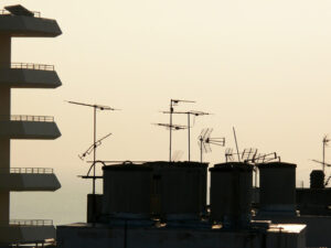 Rooftops of Torremolinos. Rooftop television antennas - MyVideoimage.com | Foto stock & Video footage