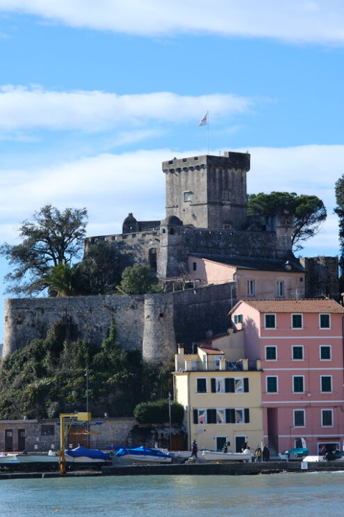 San Terenzo Castle in Lerici. Photo of a small castle by the sea. Blue sky with clouds and blue sea. - MyVideoimage.com | Foto stock & Video footage