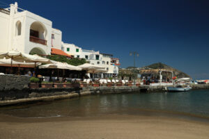 Sandy beach, sea and Sant’Angelo d’Ischia bay, near Naples. Foto Ischia photos.