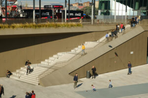 Shopping center in Milan. Staircase of the Citylife shopping center in Milan. Square with connecting stairs crossed by many people. - MyVideoimage.com | Foto stock & Video footage