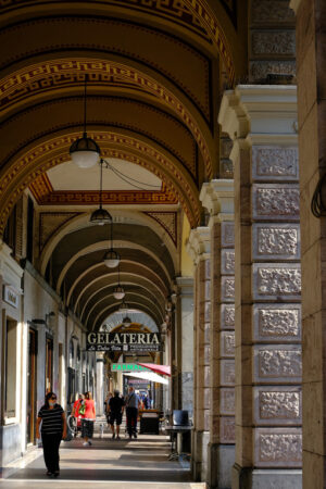 Shops in the city. Arcades with shops and people walking. Stock photos. - MyVideoimage.com | Foto stock & Video footage