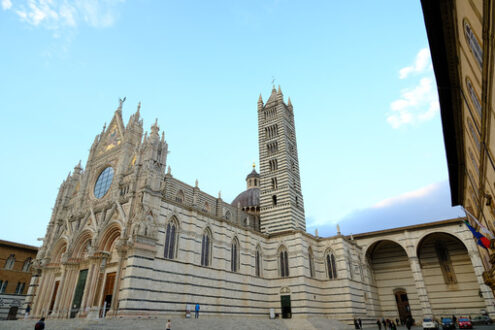 Siena Cathedral and Romanesque-Gothic bell tower. Made with white and colored marble. - MyVideoimage.com | Foto stock & Video footage