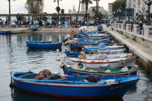 Small fishing boats in the port of Bari. At the market near the port the fishermen sell the fish caught. - MyVideoimage.com