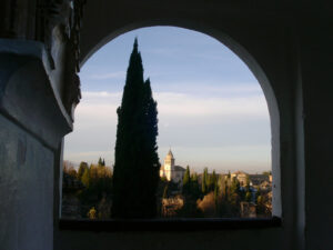 Spain. View of the Alhambra in Granada framed by an arch. Granada foto. Granada photo