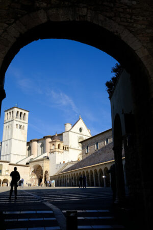 Square with the Basilica of San Francesco and the silhouette of a military security officer against terrorism. - MyVideoimage.com