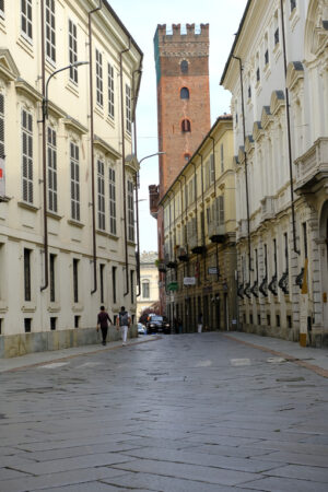 Stone pavement. Via Vittorio Alfieri in Asti and Torre Comentina. Stock photos. - MyVideoimage.com | Foto stock & Video footage