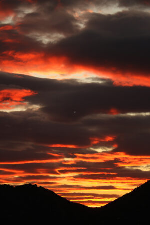 Sunset on the sea. Sky with red-illuminated clouds by the sunset light. Gulf of La Spezia in Liguria. - MyVideoimage.com | Foto stock & Video footage