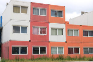 Temporary housing in steel containers. Overlapping containers wi - MyVideoimage.com