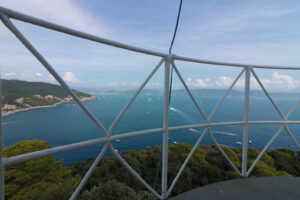 Tino island lighthouse. Panorama of the La Spezia Gulf , seen from the balcony of the lighthouse of the island of Tino, near Portovenere and the Cinque Terre. Foto mare. - MyVideoimage.com | Foto stock & Video footage