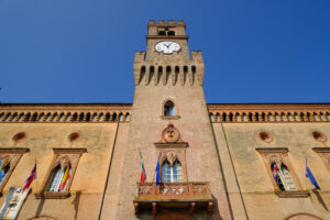 Tower with clock Neo-Gothic tower with clock built in red bricks. Stock photos. - MyVideoimage.com | Foto stock & Video footage