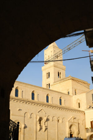 Tramonto a Matera. Cathedral Church of the Madonna della Bruna and of Sant’Eustachio in Matera. Built in tuff stone. Sunset light. Matera foto. - MyVideoimage.com | Foto stock & Video footage