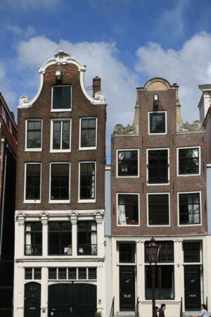 Typical Dutch houses seen from the canals of Amsterdam. Amsterdam foto. Amsterdam photo