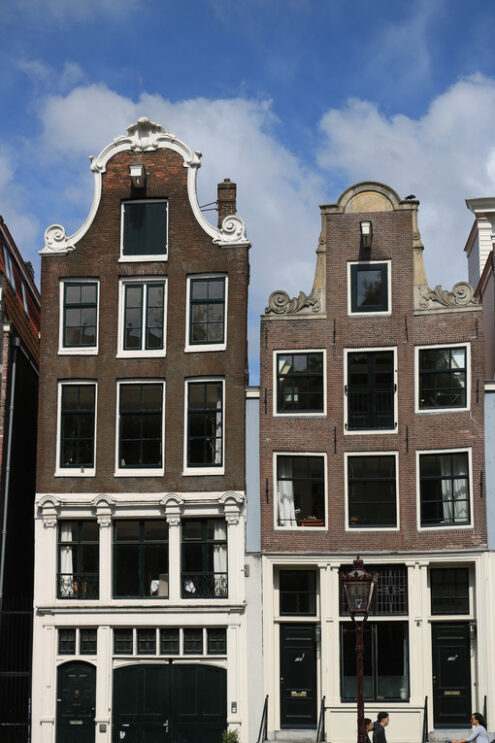 Typical Dutch houses seen from the canals of Amsterdam. Amsterdam foto. Amsterdam photo