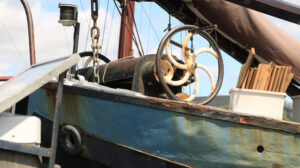 Typical transport boat anchored in the Amsterdam canals. Many ol - MyVideoimage.com