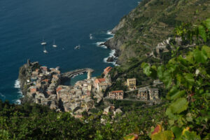 Vernazza tower. Ancient tower dominates the sea with boats. Cinque Terre, La Spezia, Italy. - MyVideoimage.com | Foto stock & Video footage