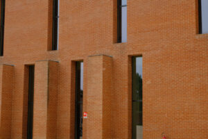 Vertical windows. Vertical windows on a brick wall. Stock photos. - MyVideoimage.com | Foto stock & Video footage