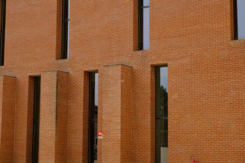 Vertical windows. Vertical windows on a brick wall. Stock photos. - MyVideoimage.com | Foto stock & Video footage