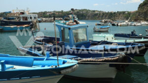 Video fishing boats. Boats anchored in the port of Corricella on the Island of Procida.  Video footage. - MyVideoimage.com | Foto stock & Video footage