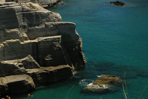 Volcanic rocks and rocks in the Mediterranean sea of Ischia. Foto Ischia photos.