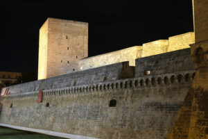 Walls of the Norman Swabian castle of Bari. Filming with night lighting of the fort built by Frederick II. Foto Bari photo.