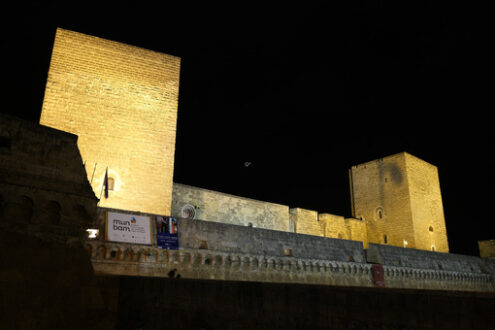 Walls of the Norman Swabian castle of Bari. Filming with night lighting of the fort built by Frederick II. - MyVideoimage.com