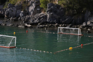 Water polo court. Water polo field with doors and floats in the green sea. - MyVideoimage.com | Foto stock & Video footage