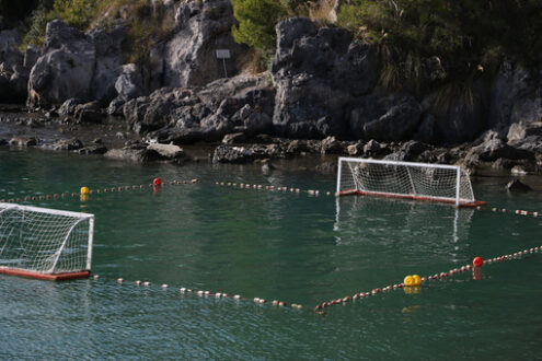 Water polo court. Water polo field with doors and floats in the green sea. - MyVideoimage.com | Foto stock & Video footage