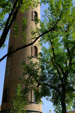 Water tower. Cylindrical brick tower soars into the blue sky. Stock photos. - MyVideoimage.com | Foto stock & Video footage