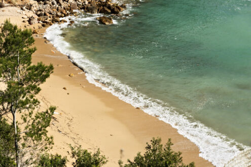 Waves of the sea break on the rocks. - MyVideoimage.com