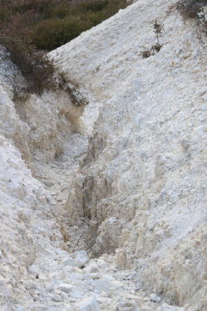 White rocks at the Parco delle Biancane. In the geothermal park the  hydrogen sulfide cause a chemical reaction with the limestone transforming it into plaster. Monterotondo Marittimo, near Larderello, Tuscany - MyVideoimage.com