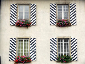 Windows with striped decorated shutters - MyVideoimage.com