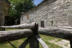 Wooden fence. Houses in stone and white marble stones.  Campocatino, Garfagnana, Apuan Alps, Lucca, Tuscany. Italy. - MyVideoimage.com | Foto stock & Video footage